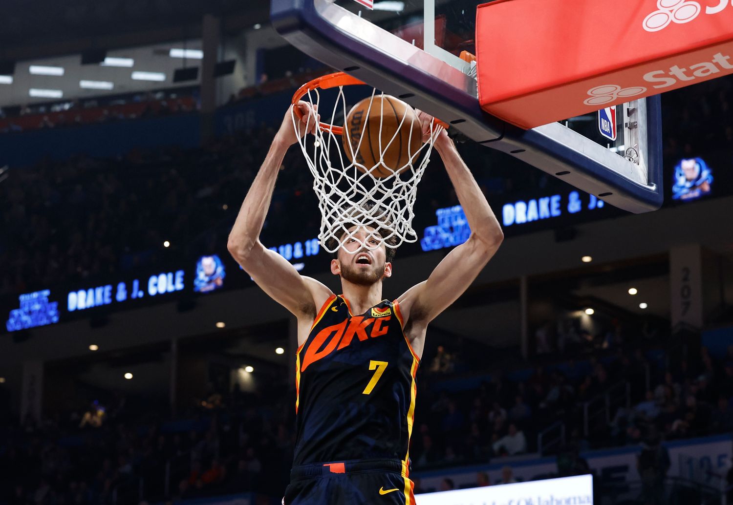 Feb 11, 2024; Oklahoma City, Oklahoma, USA; Oklahoma City Thunder forward Chet Holmgren (7) dunks against the Sacramento Kings during the second half at Paycom Center.